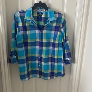 A bold plaid blouse